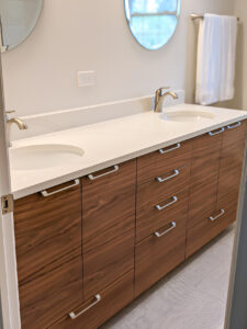 Durable quartz countertop in Austin bathroom remodel with neutral tones