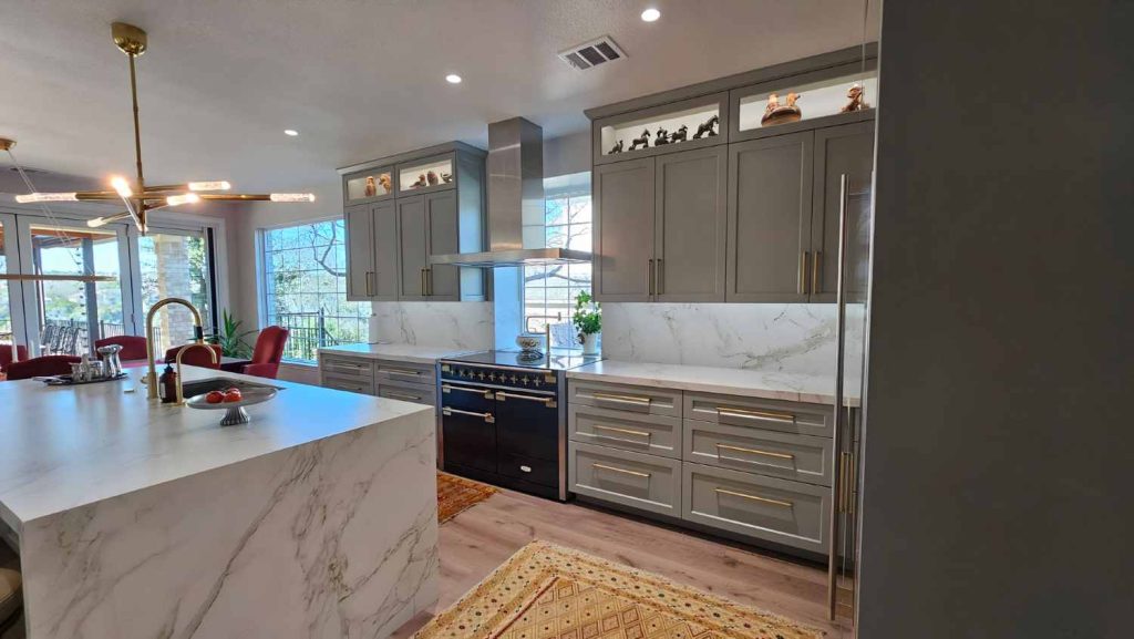 "Austin kitchen and bathroom remodel – adjustable range hood and amazing wood floors in Austin"